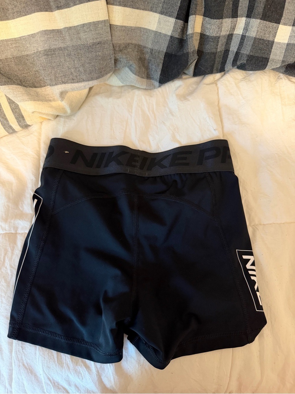 Nike Black Athletic Compression Shorts with Subtle White Logo